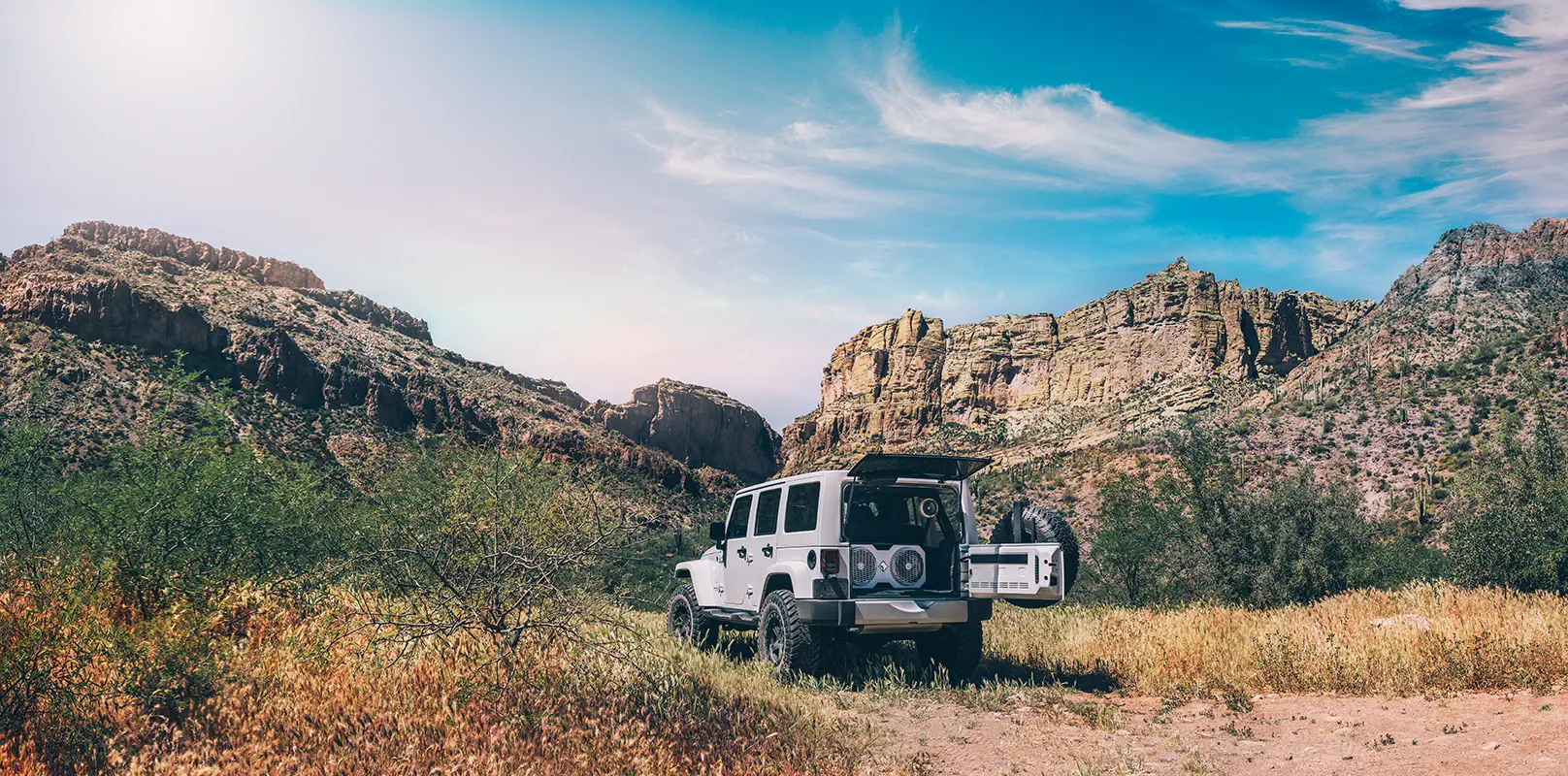 Jeep Gladiator Rubicon fitted out by Radio Waves, parked off-road at sunset in the Eastern Cape